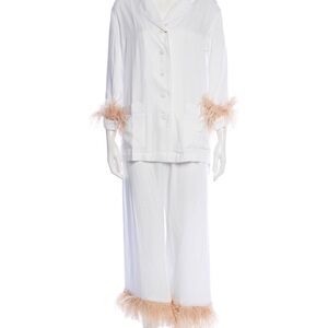 SLEEPER pajamas never worn. Double feathers champagne colored. Size XL